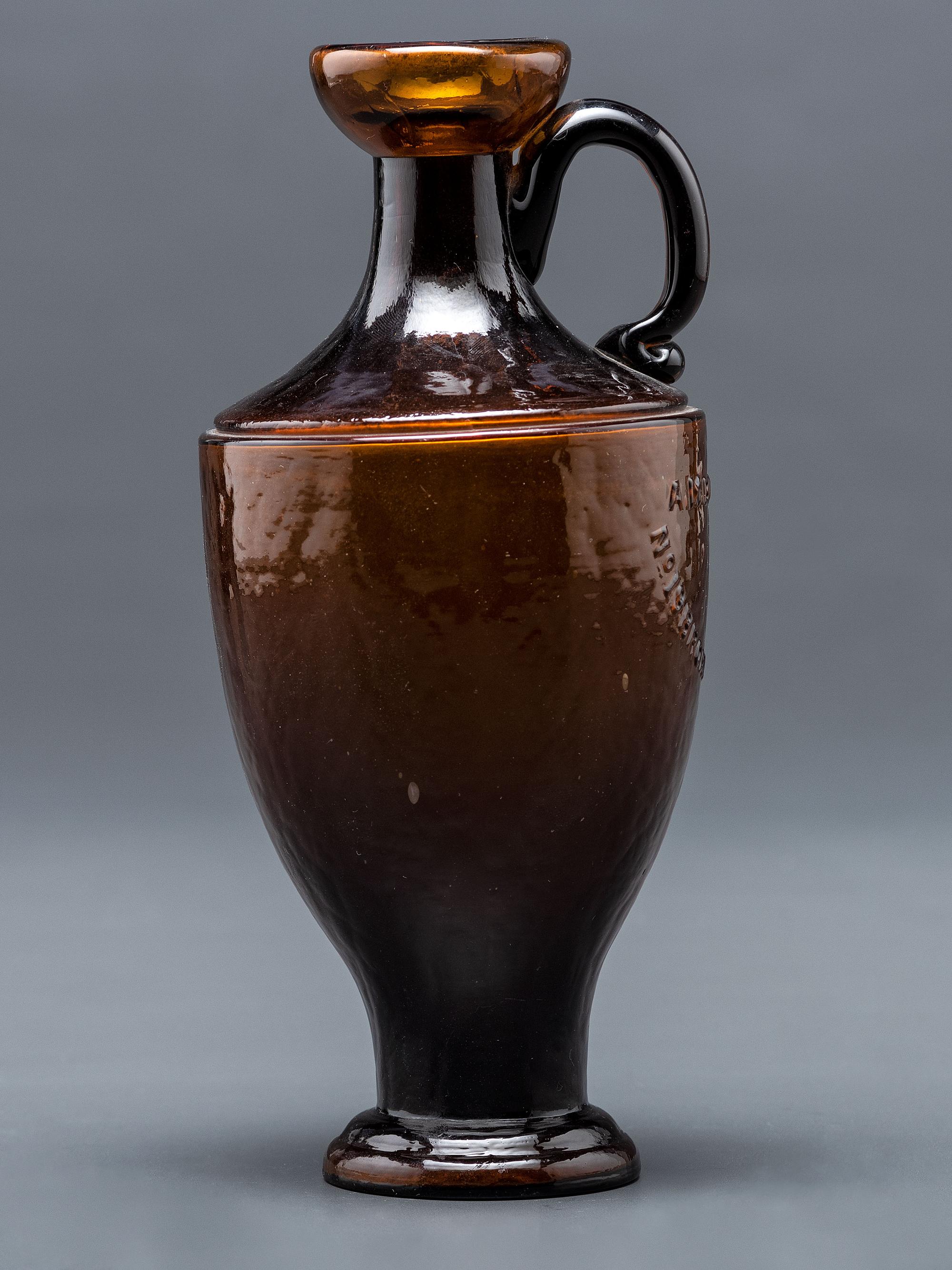 A New York Mold-Blown Amber Bottle