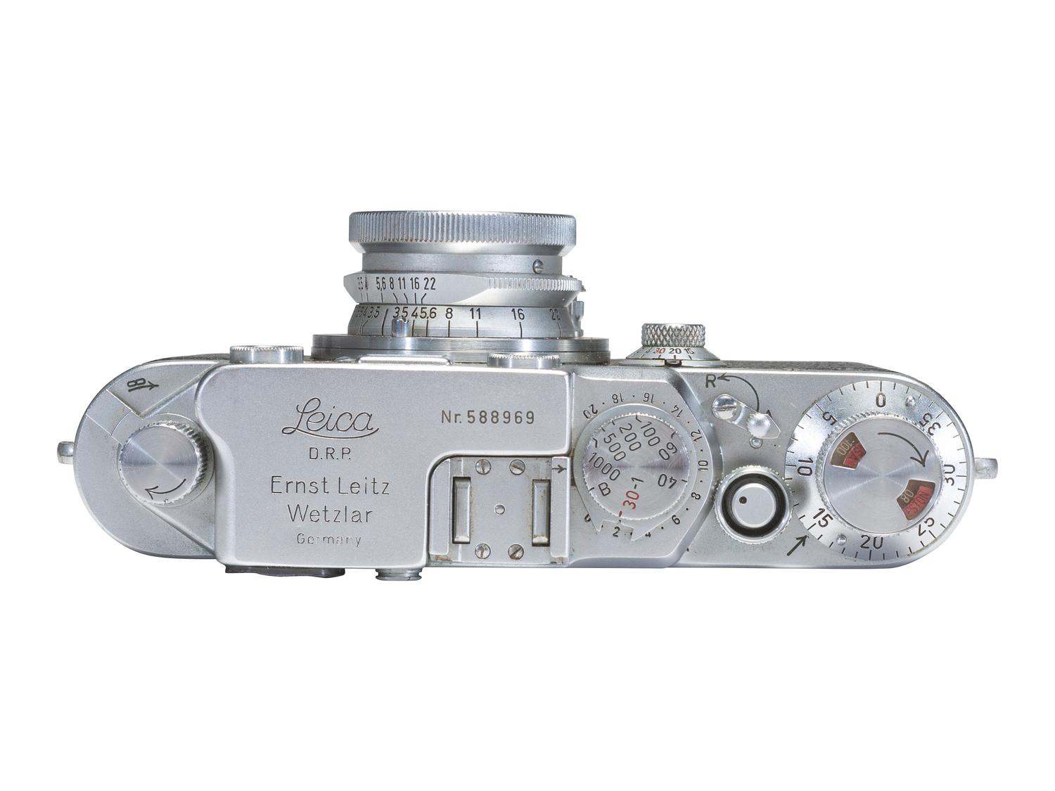 [CAMERAS]. Leica III 35mm camera with accessories and contemporary literature.