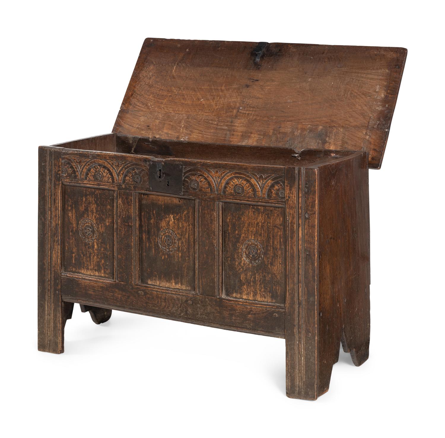 A Charles II Carved Oak Plank Chest