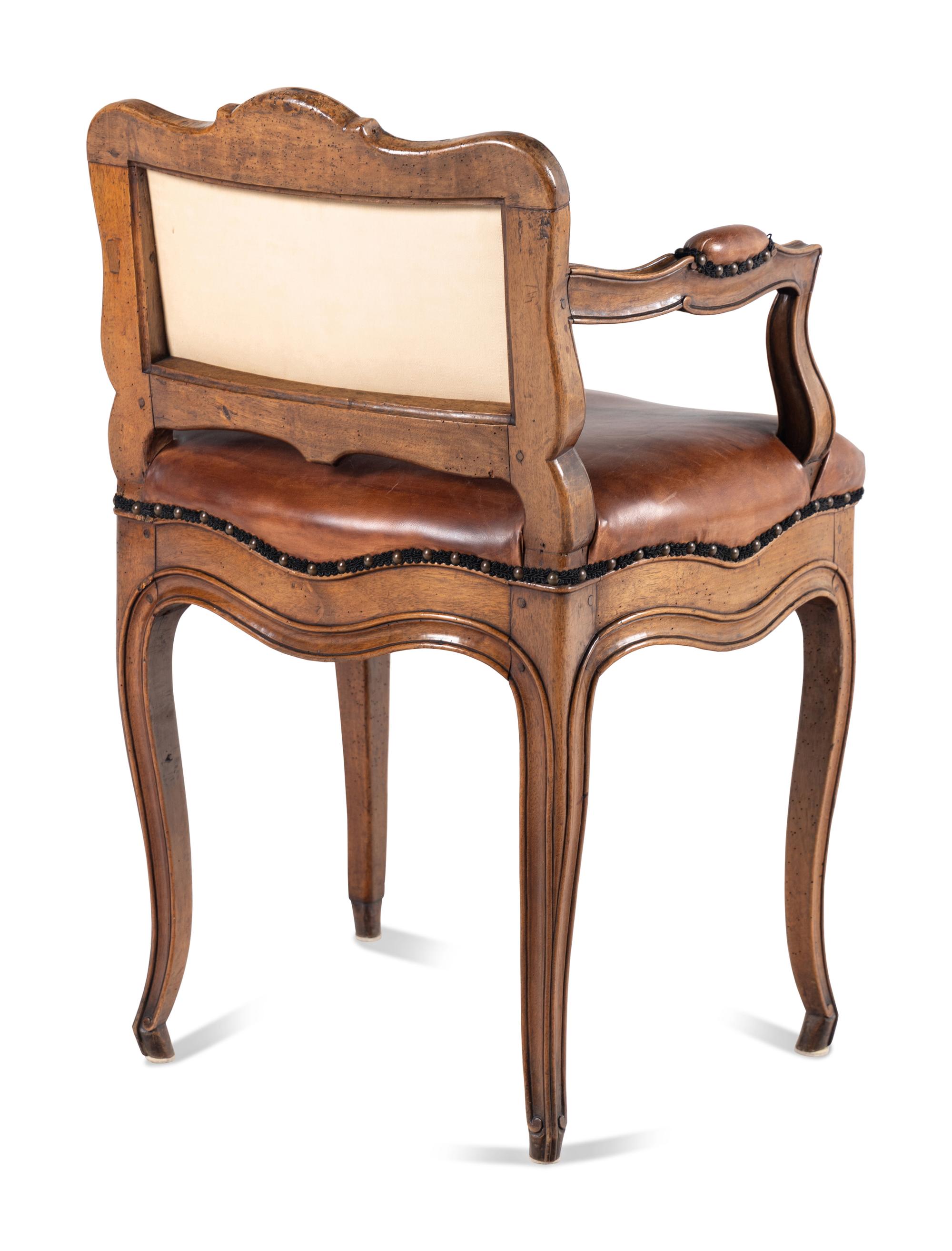 A Louis XV Leather-Upholstered Walnut Bureau Chair