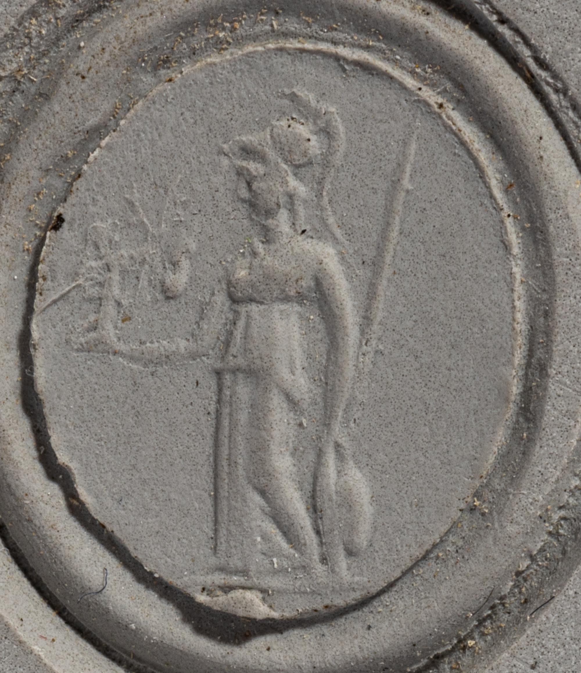 A Roman Gold and Carnelian Finger Ring with the Goddess Minerva Holding Nike