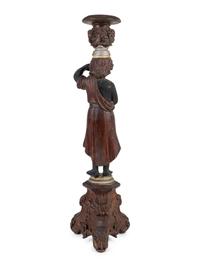 An Italian Walnut Figural Pedestal — 19TH CENTURY