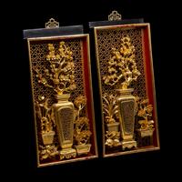 A Matched Pair of Chinese Gilt and Red Lacquered Wood Panels