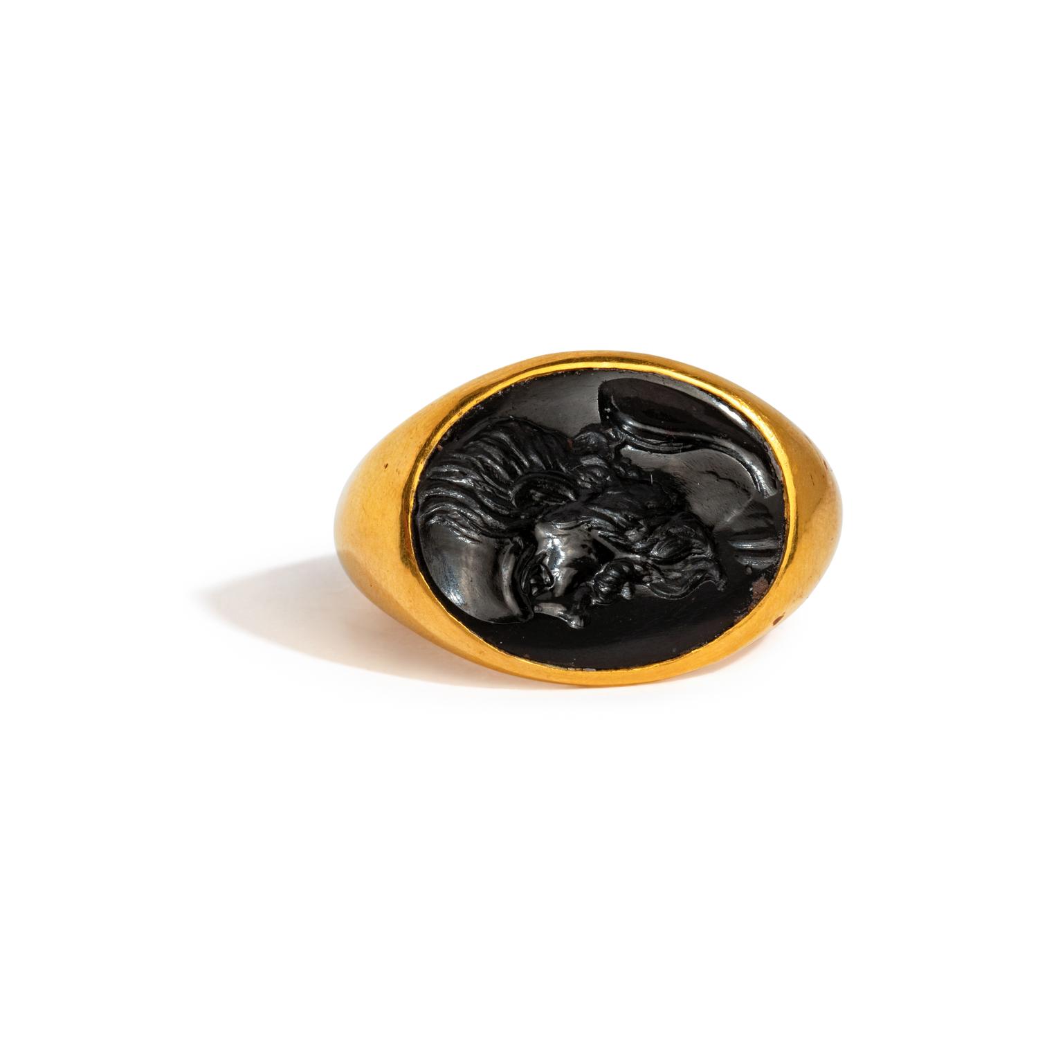 A Roman Black Jasper Intaglio with a Portrait Head of Socrates — Set in a gold ring