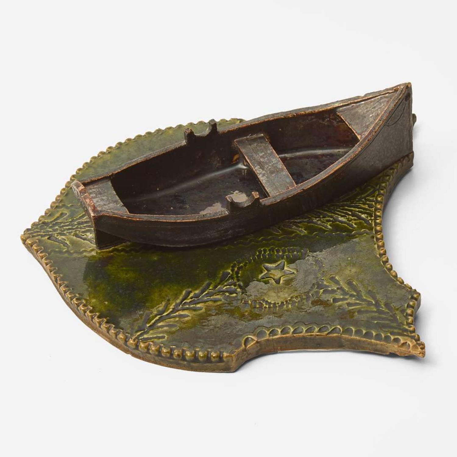 George Ohr (American, 1857-1918) Novelty Shield-Form Pen Tray with Boat in Olive and Brown Glaze, Biloxi, Mississippi, USA, circa 1895-1896