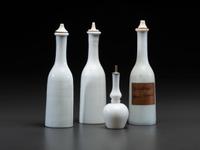 Four Hand Painted Milk Glass Barber Bottles