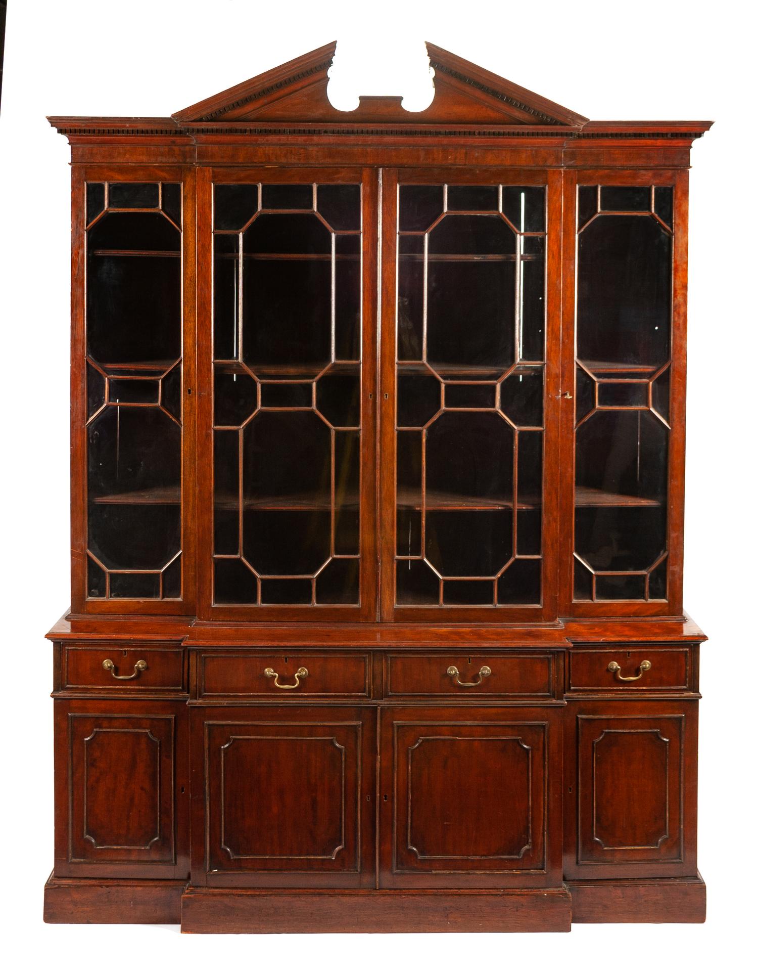 A George III Mahogany Breakfront Bookcase Height 100 1/2 x width 75 1/4 x depth 23 1/2 inches. — 19TH CENTURY