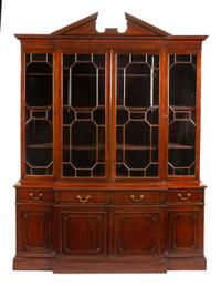 A George III Mahogany Breakfront Bookcase Height 100 1/2 x width 75 1/4 x depth 23 1/2 inches. — 19TH CENTURY