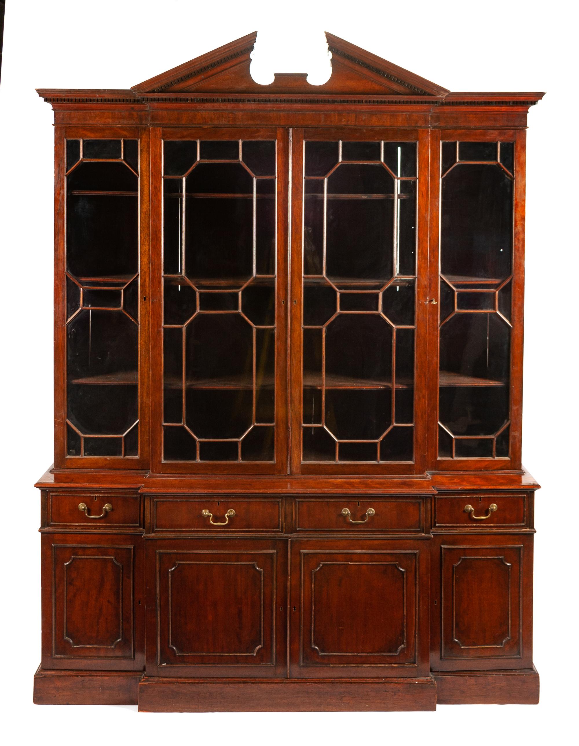 A George III Mahogany Breakfront Bookcase Height 100 1/2 x width 75 1/4 x depth 23 1/2 inches. — 19TH CENTURY