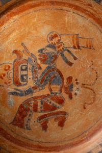 A Maya Polychrome Tripod Plate with a Seated Maize God