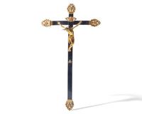 An Italian gilt bronze and ebonized wood crucifix, Naples, 17th century