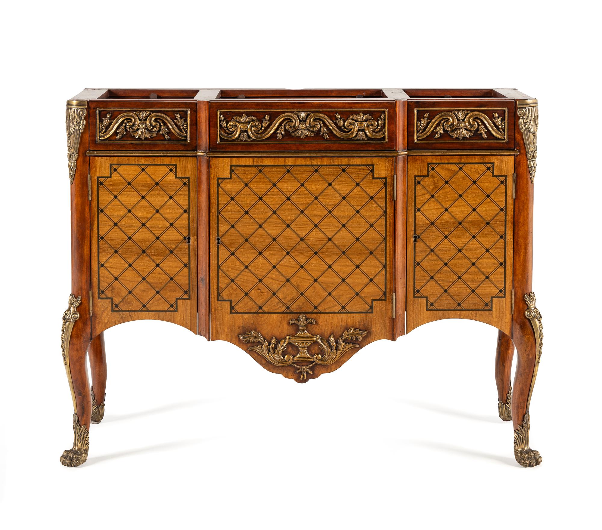 A Louis XV/XVI Transitional Style Gilt Bronze Mounted Marquetry Commode