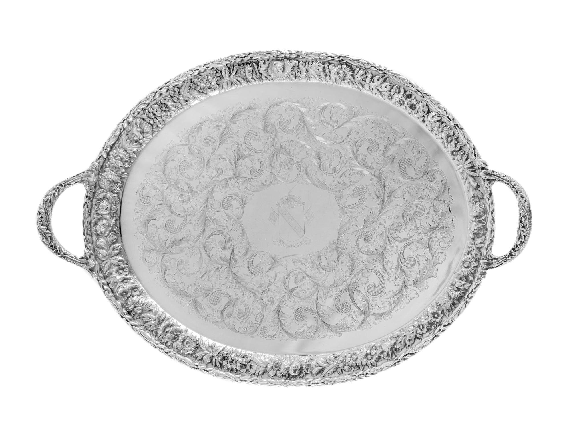 An American Silver Serving Tray, S. Kirk & Son, Baltimore, MD, the twin-handled tray having a repousse floral and foliate border, the f