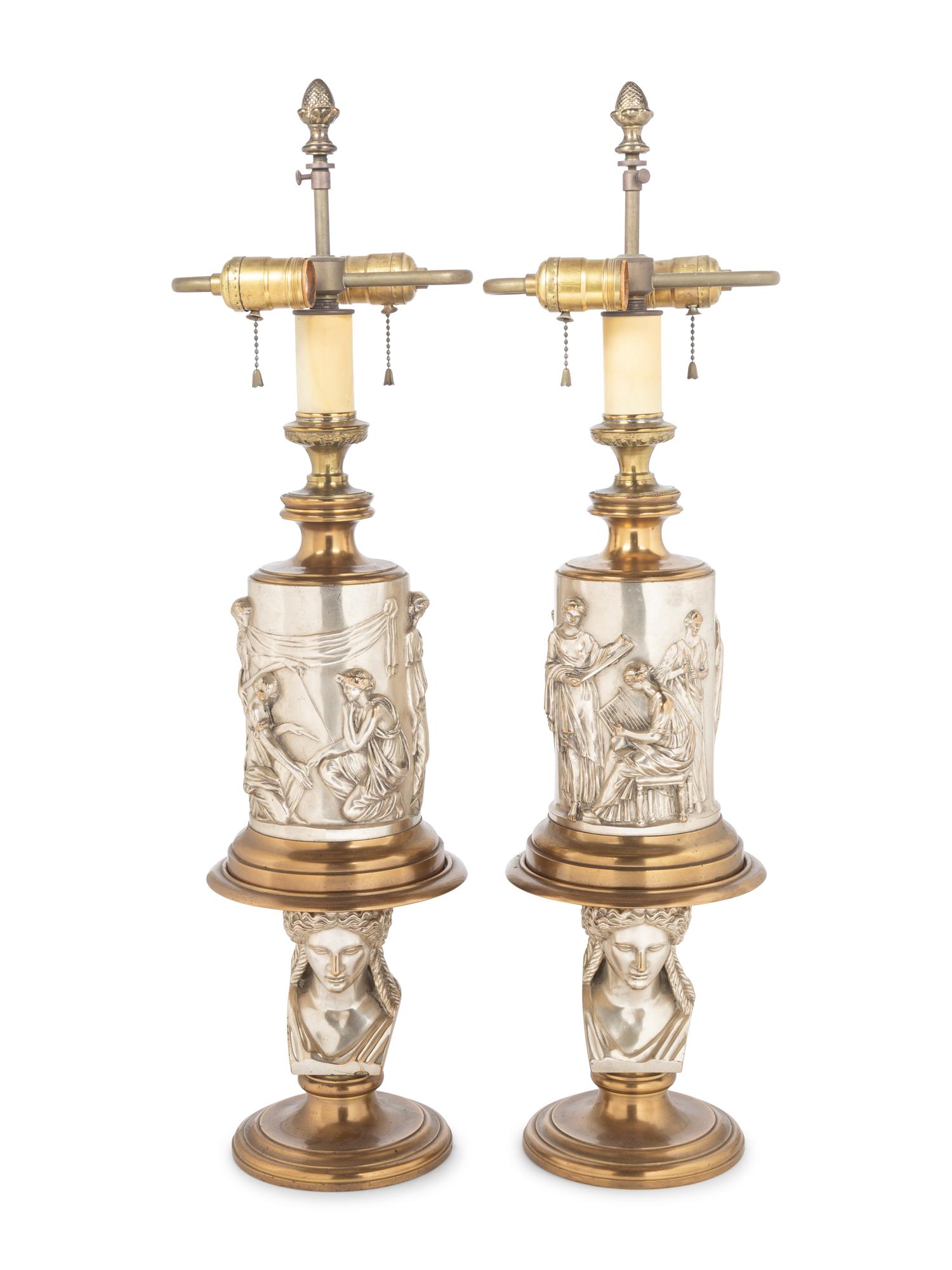A Pair of Continental Gilt and Silvered Bronze Lamps
