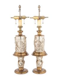 A Pair of Continental Gilt and Silvered Bronze Lamps