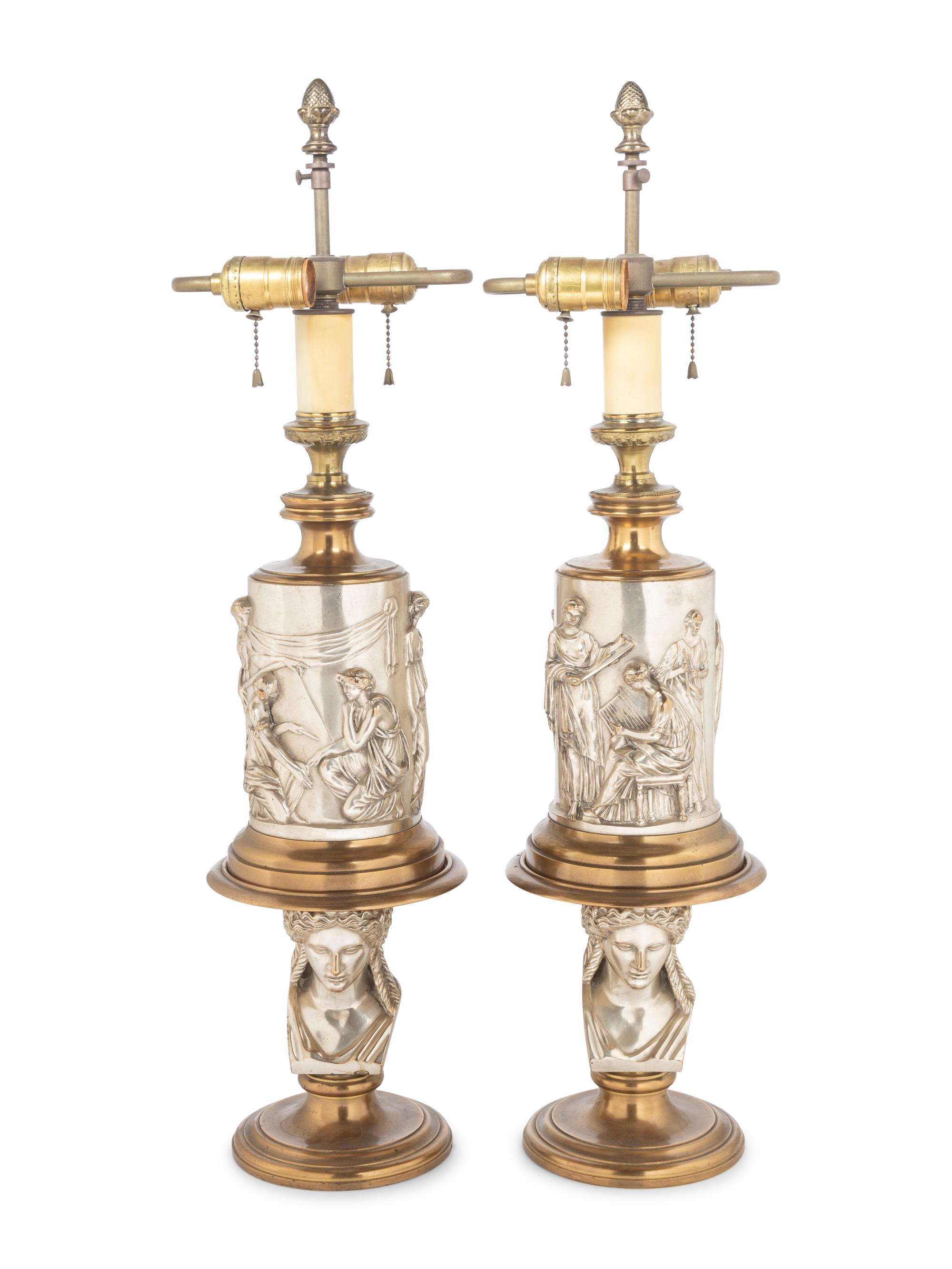 A Pair of Continental Gilt and Silvered Bronze Lamps
