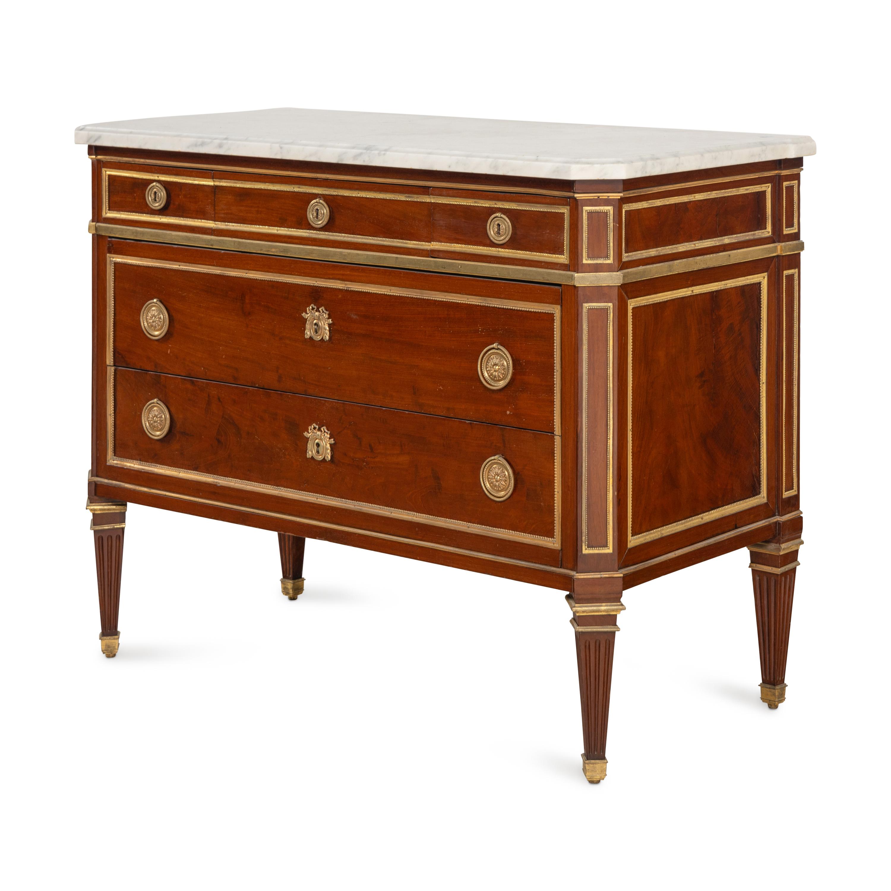 A Louis XVI Gilt Bronze-Mounted Mahogany Marble-Top Commode