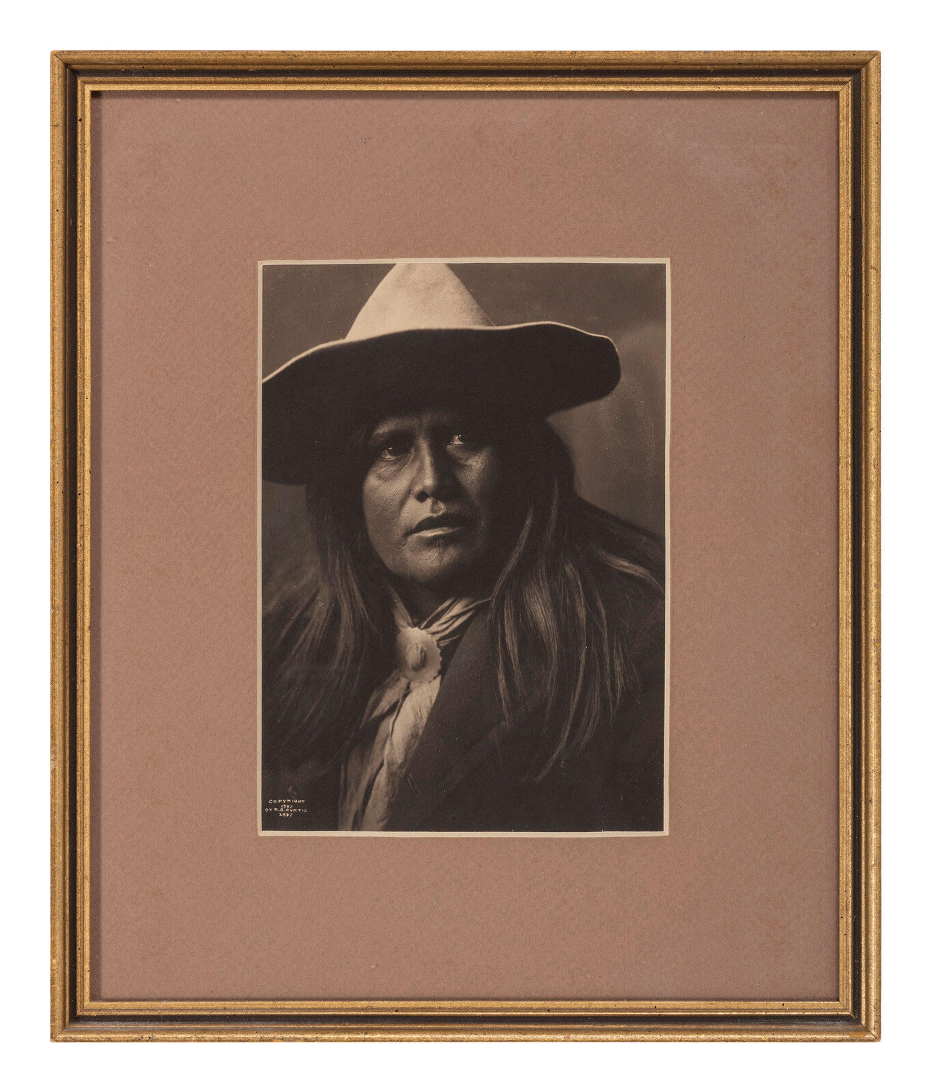 Curtis, Edward S. (1868-1952), photographer. A pair of works, comprising two platinum photographs of Native American subjects.
