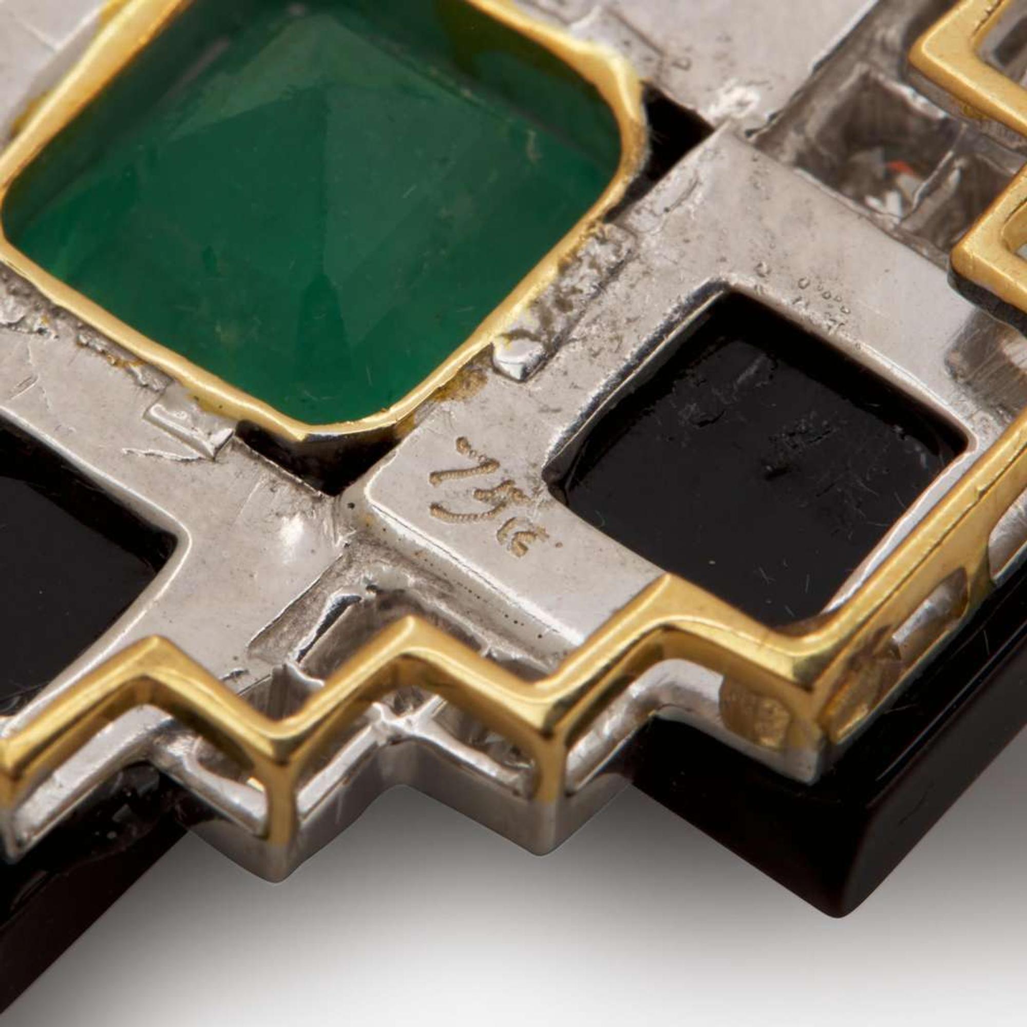 An 18K Gold, Emerald, Onyx, and Diamond Necklace