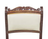 A rare set of ten Anglo-Indian Neoclassical carved hardwood side chairs, circa 1830-1840