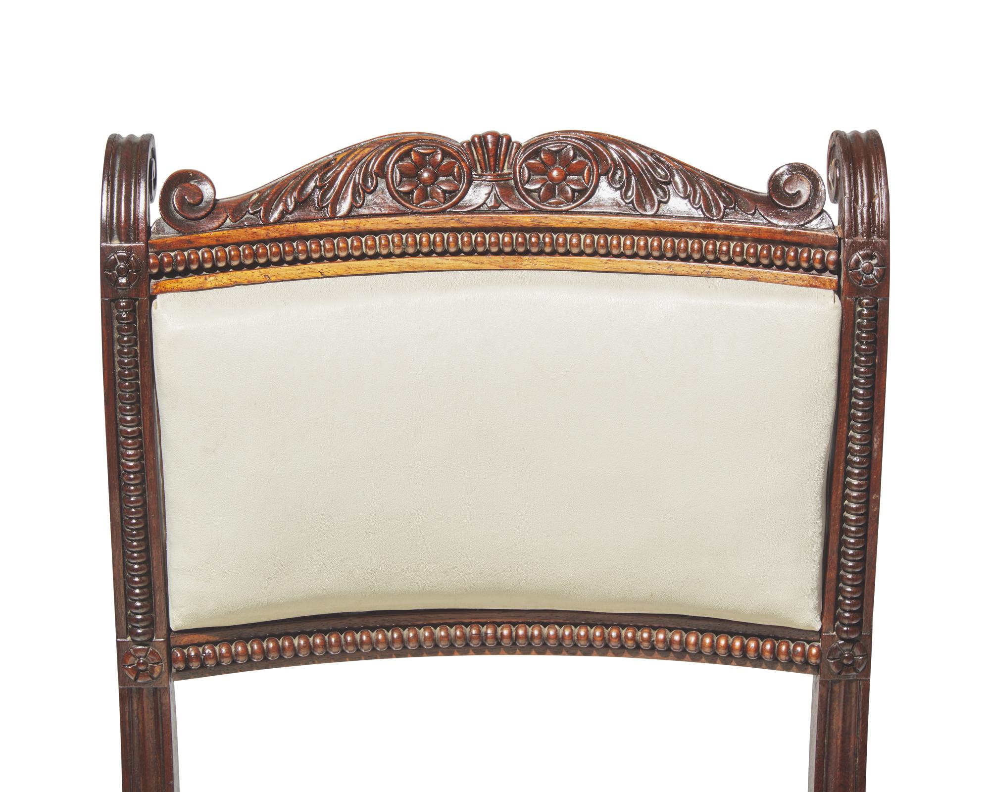 A rare set of ten Anglo-Indian Neoclassical carved hardwood side chairs, circa 1830-1840