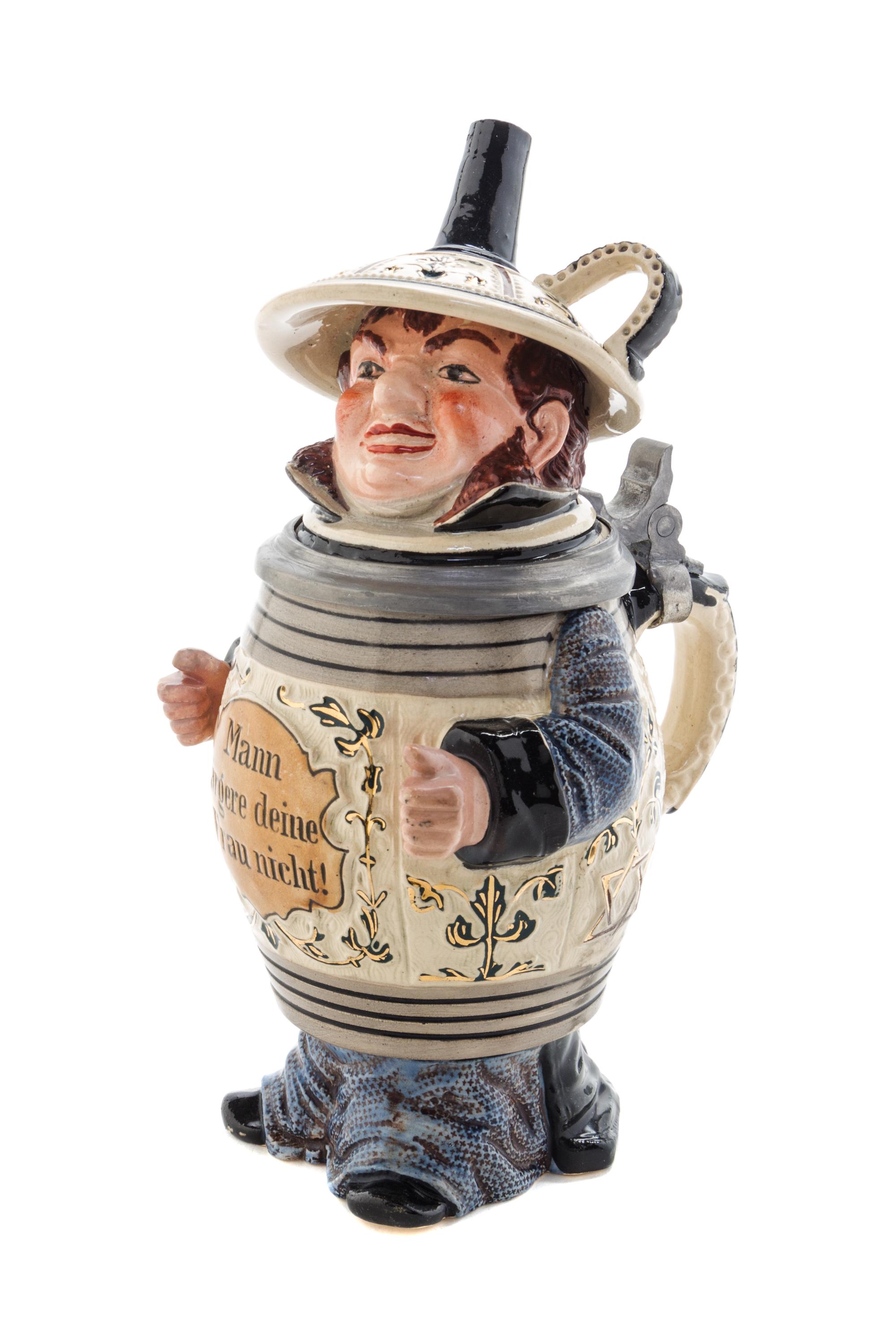 A German Pewter Mounted Character Stein Height 9 1/2 inches. — 19TH/20TH CENTURY