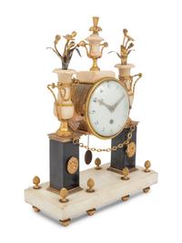 A Directoire Gilt Bronze and Marble Mantel Clock