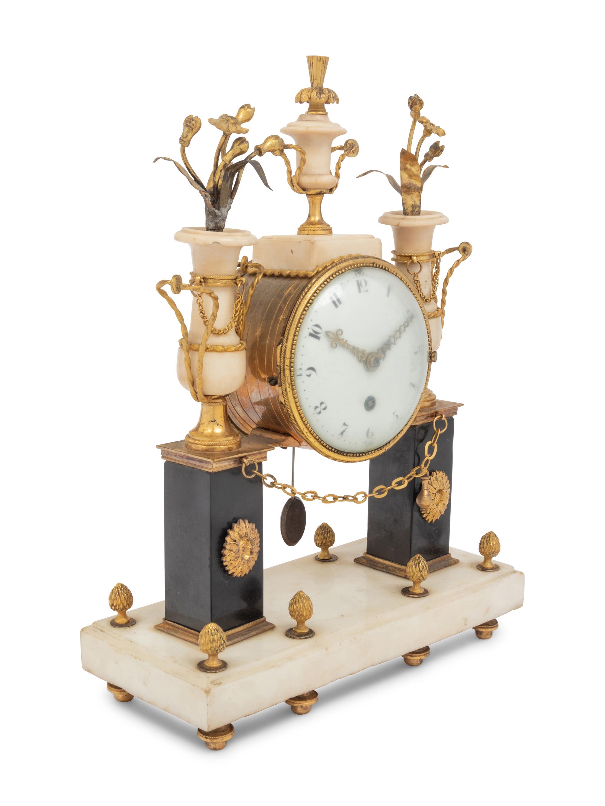 A Directoire Gilt Bronze and Marble Mantel Clock
