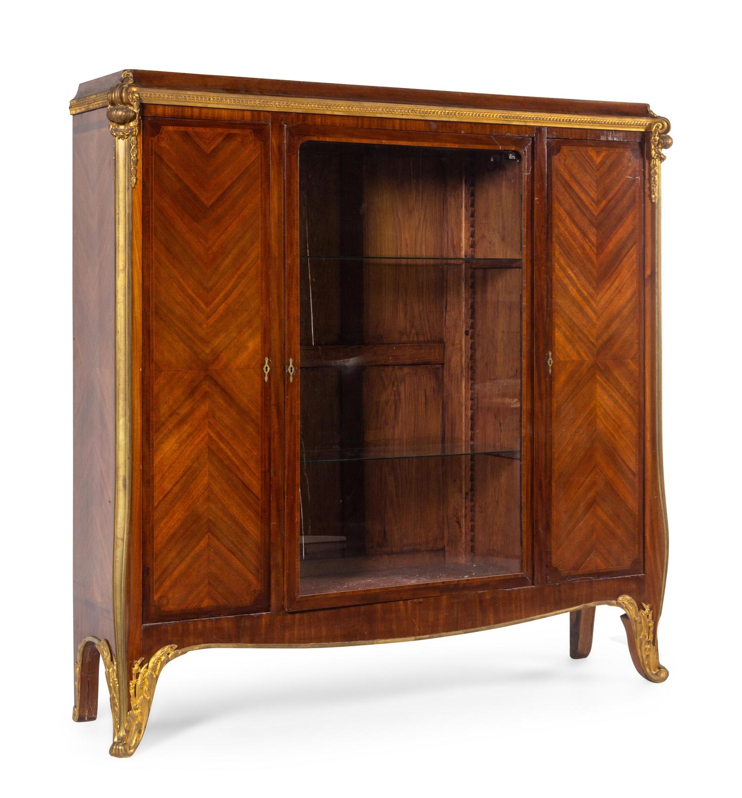 A Louis XV Style Gilt Bronze Mounted Mahogany Veneered Vitrine