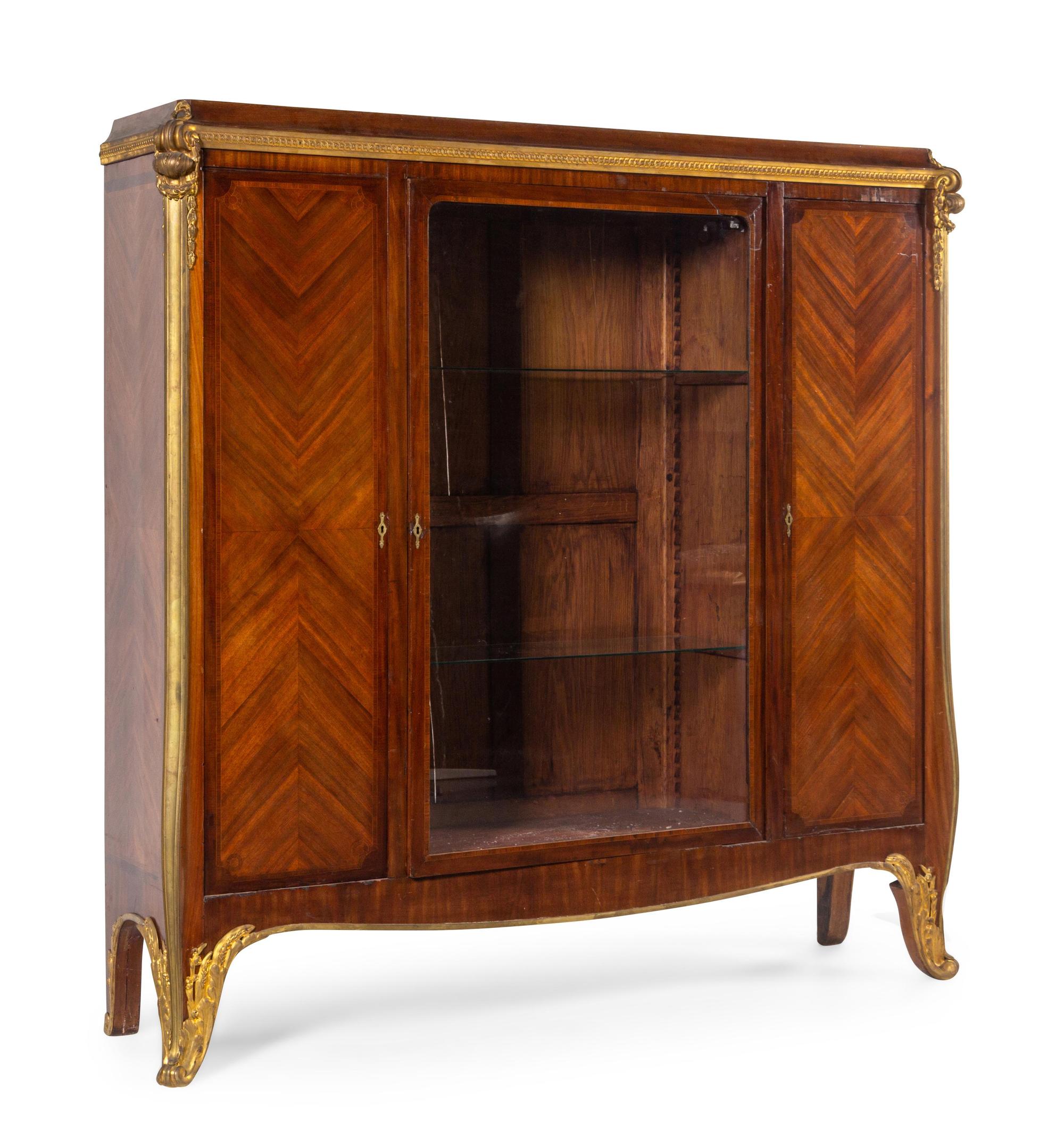 A Louis XV Style Gilt Bronze Mounted Mahogany Veneered Vitrine