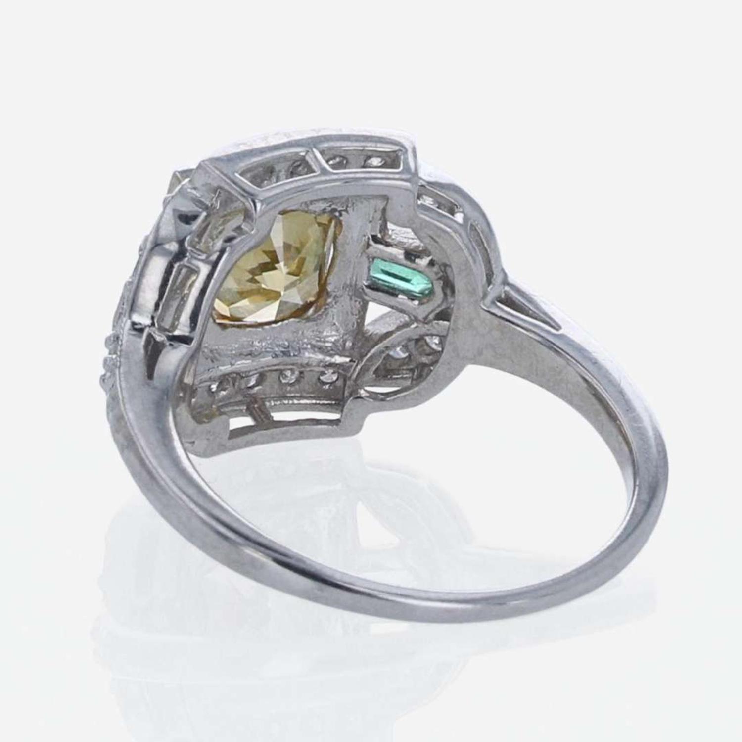 A Colored Diamond, Diamond, Emerald, and 18K White Gold Ring