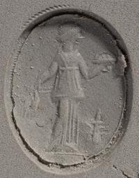 A Roman Carnelian Ring Stone with the Goddess Ceres — Set in a gold ring