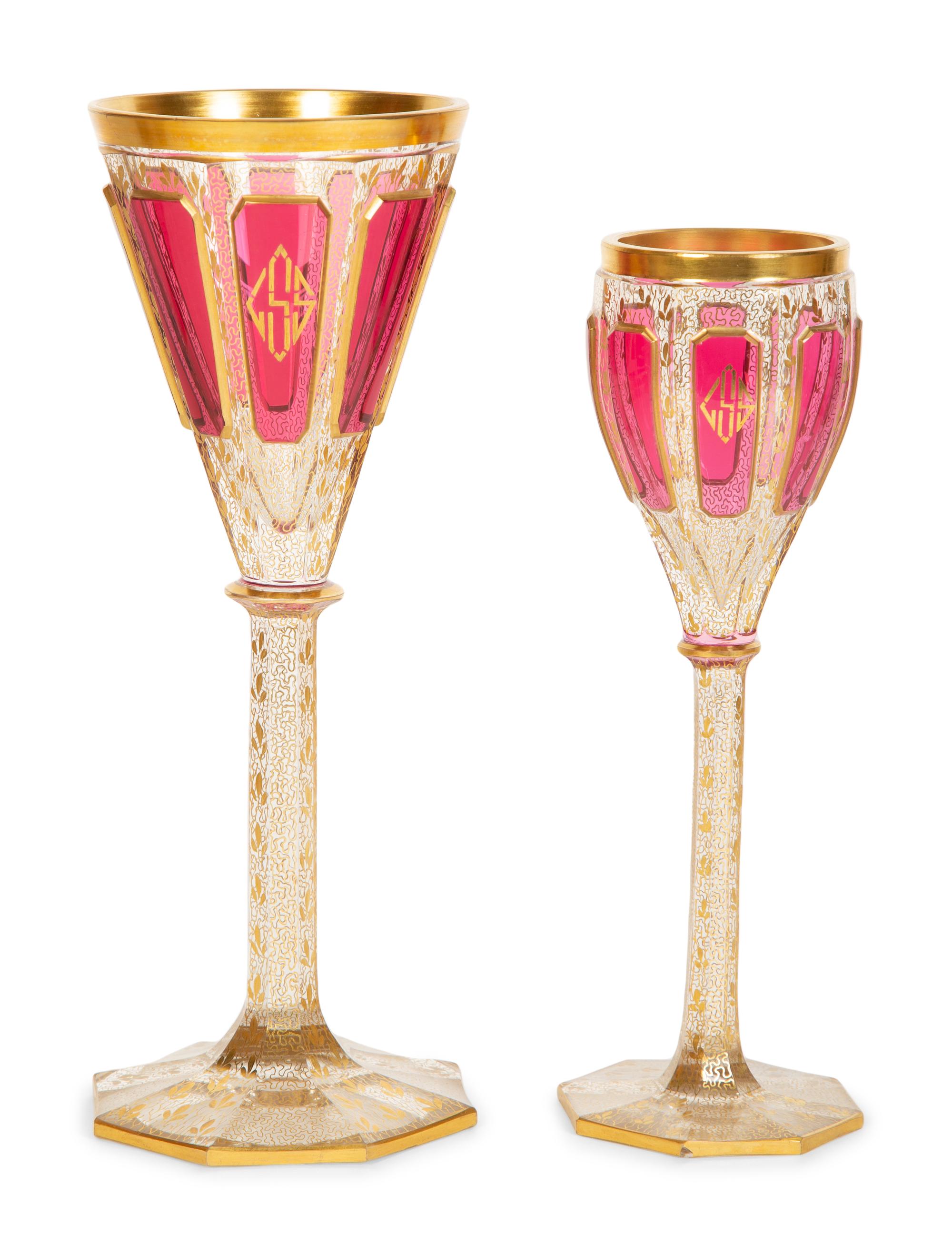A Set of Bohemian Gilt Decorated Glass Stemware