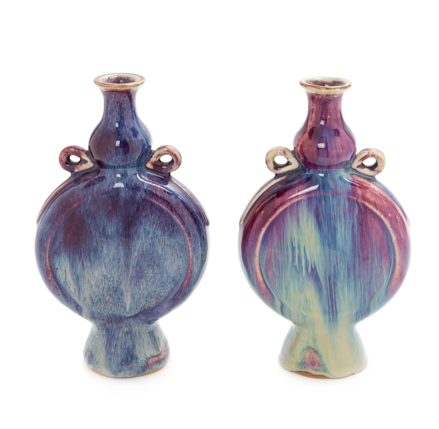 A Pair of Chinese Flambe Porcelain Flasks Height of each 9 inches.