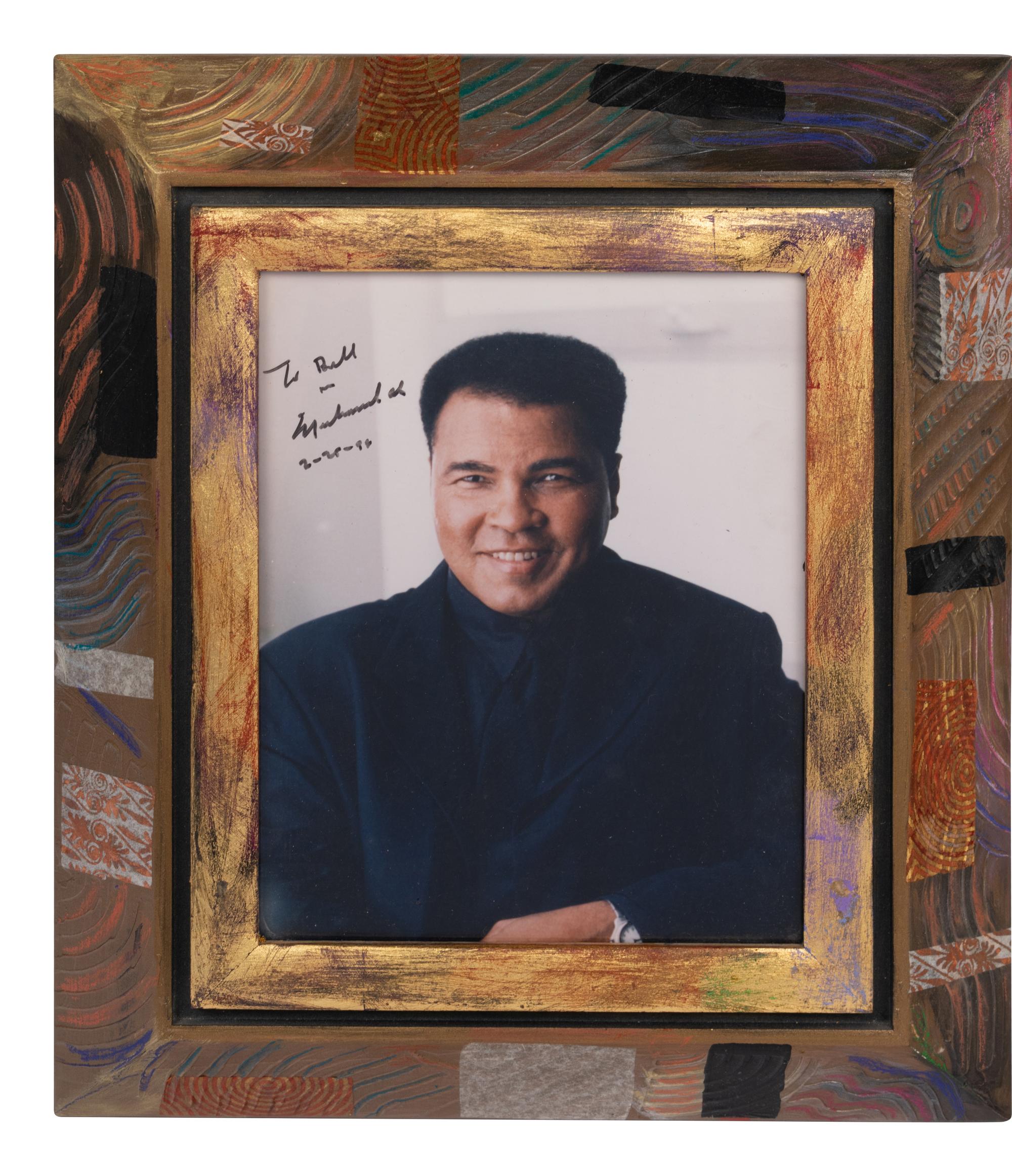 (Sports) ALI, Muhammad (1942-2016). A group of photographs and ephemera concerning Muhammad Ali, comprising: