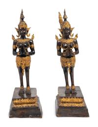 A Pair of Thai Parcel Gilt and Patinated Bronze Mythical Figures