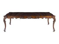 A George II Style Carved Walnut Dining Table