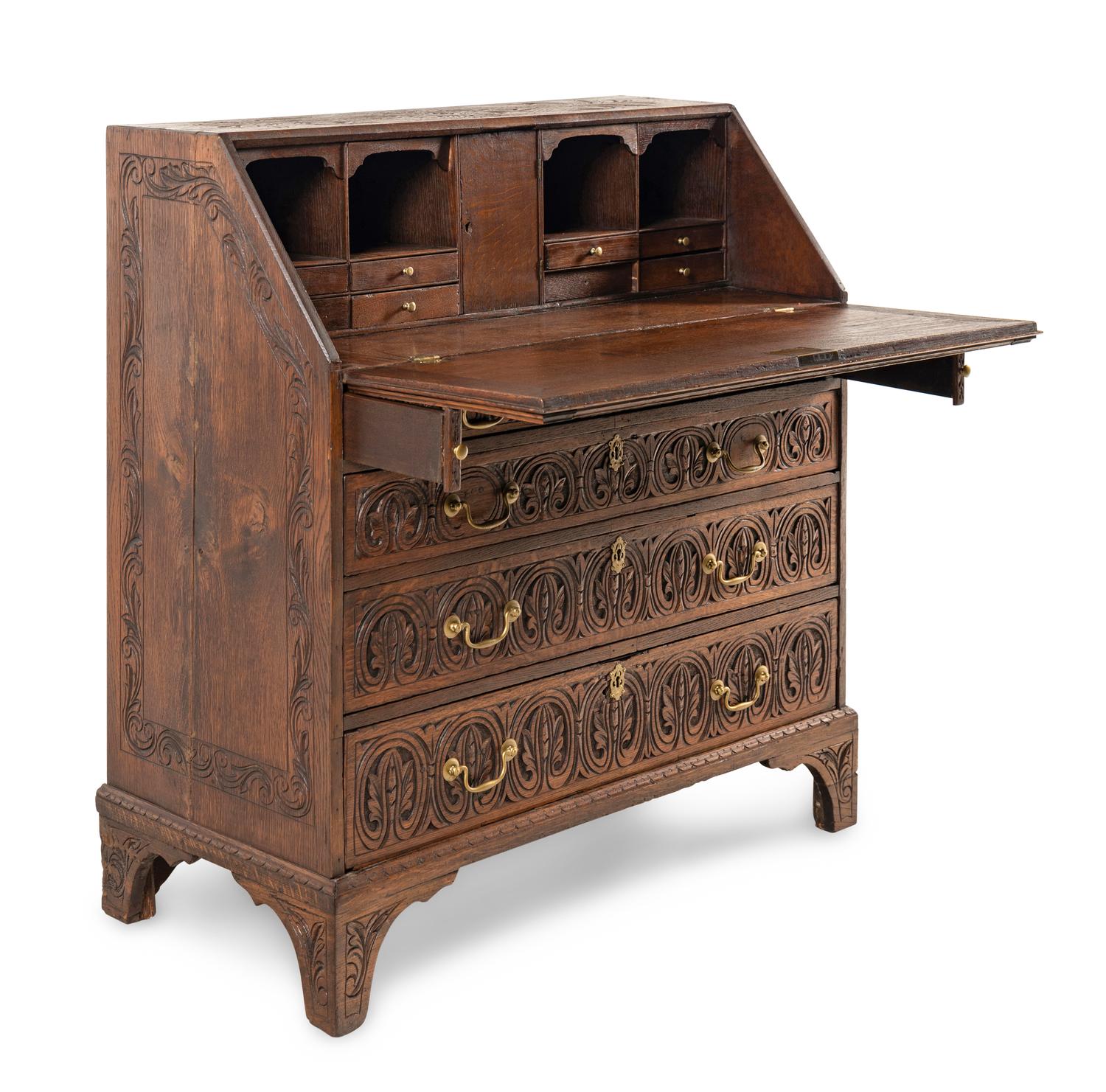 An Anglo-Indian Style Carved Oak and Marquetry Fall-Front Bureau