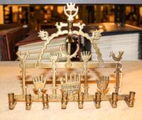 A Brass Menorah Height 8 5/8 inches.