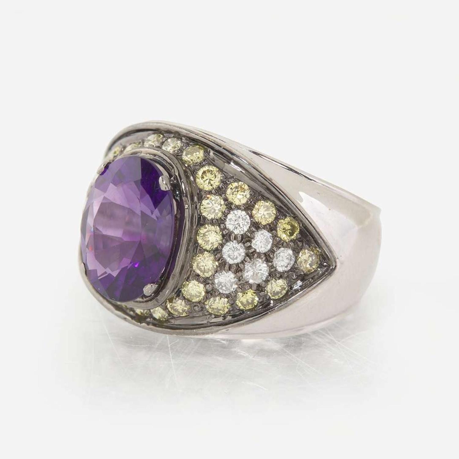 An Amethyst, Diamond, and Yellow Diamond Ring