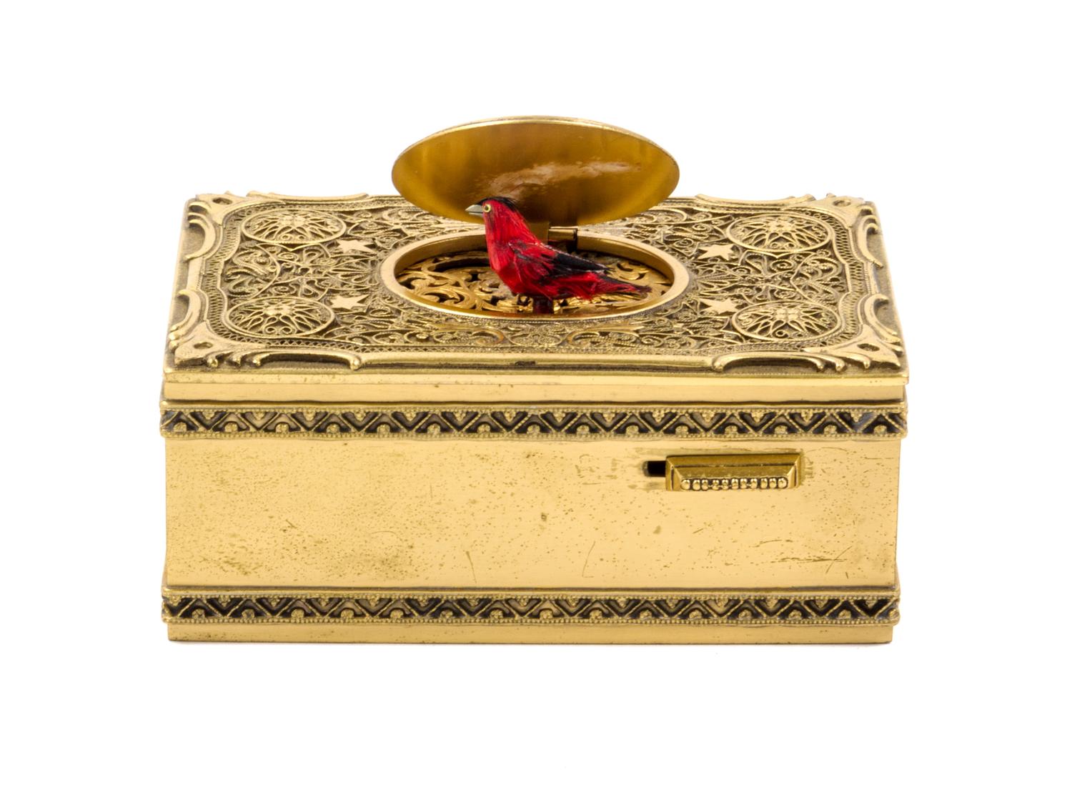 A German Gilt Filigree Singing Bird Automaton Box Width 4 1/4 inches.