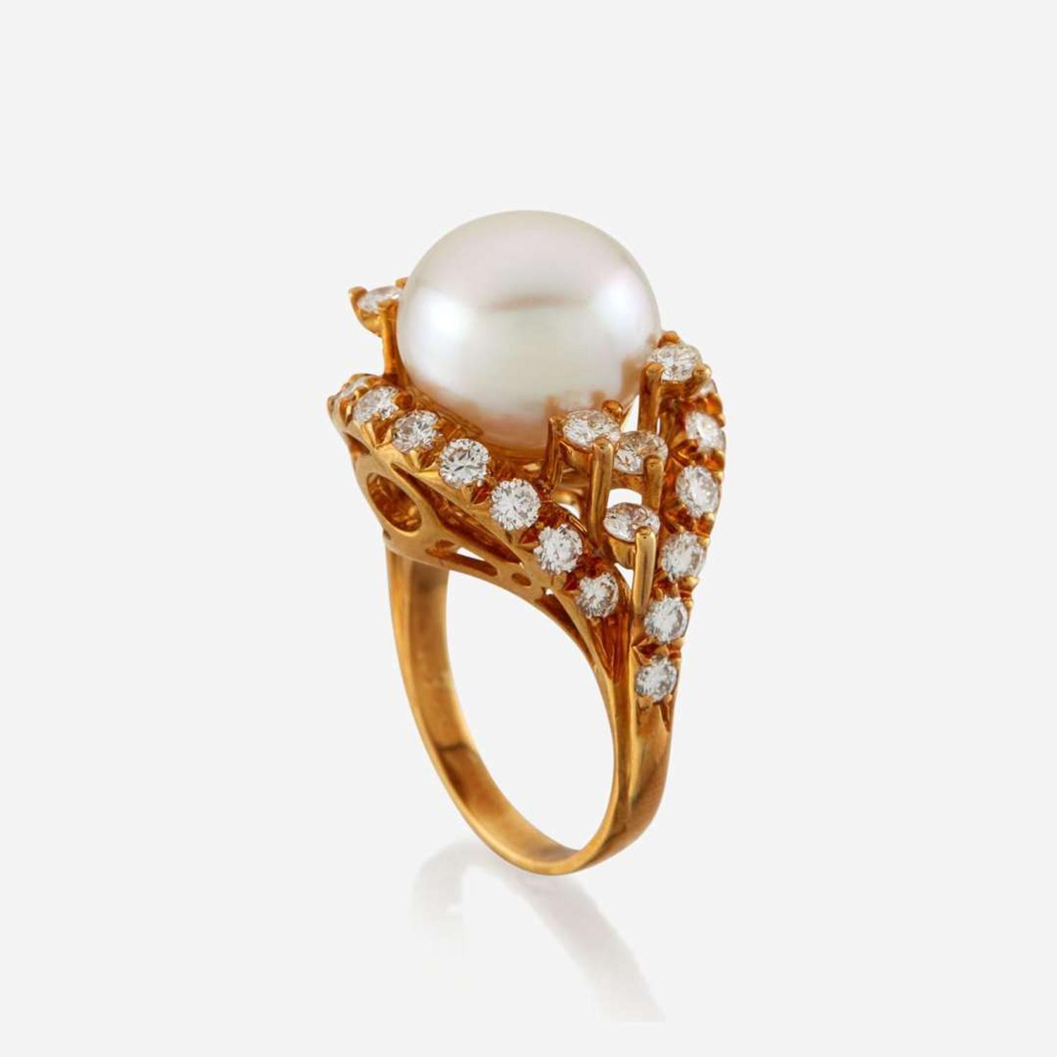 A cultured pearl, diamond, and gold ring
