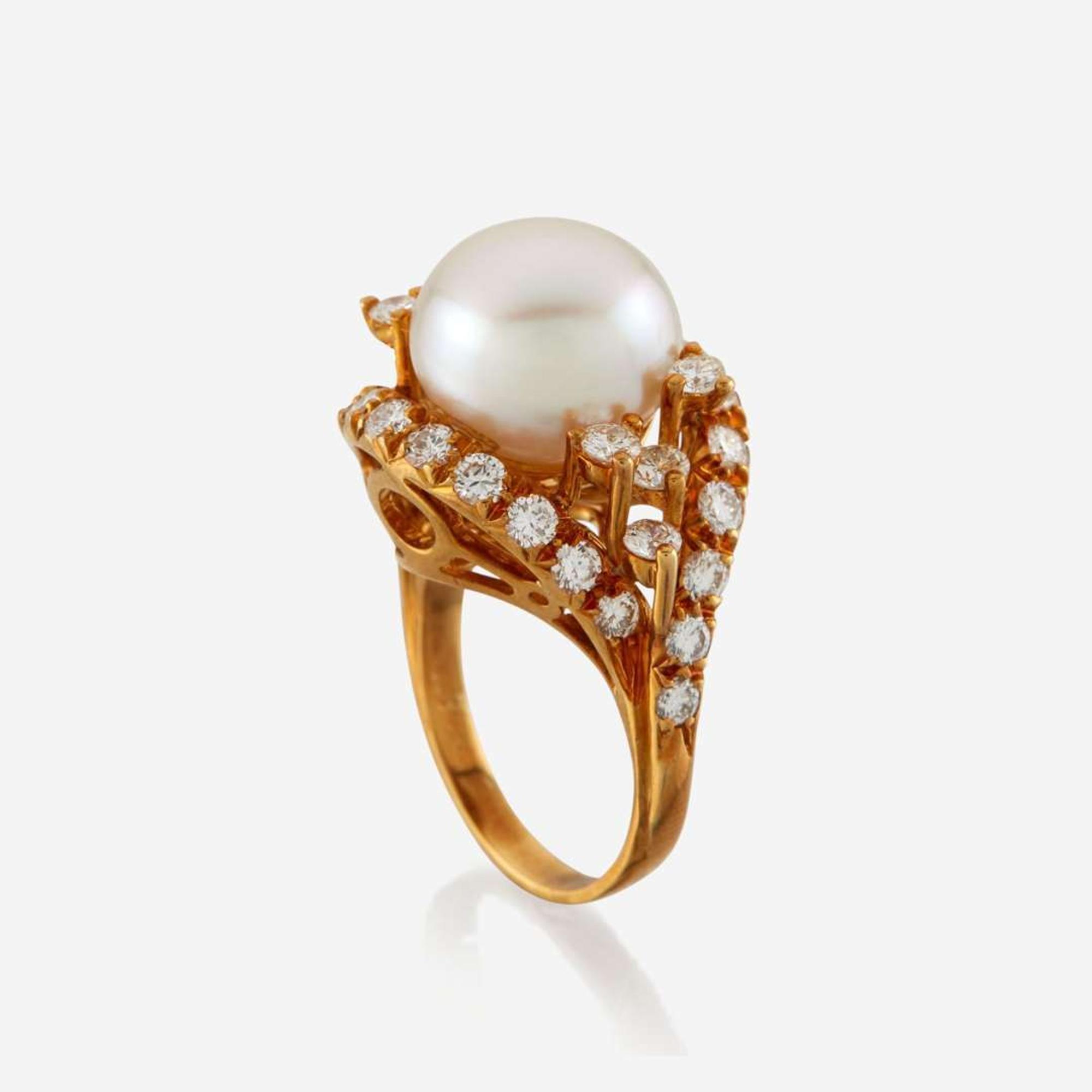 A cultured pearl, diamond, and gold ring