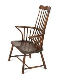 A George III Oak Comb-Back Windsor Armchair
