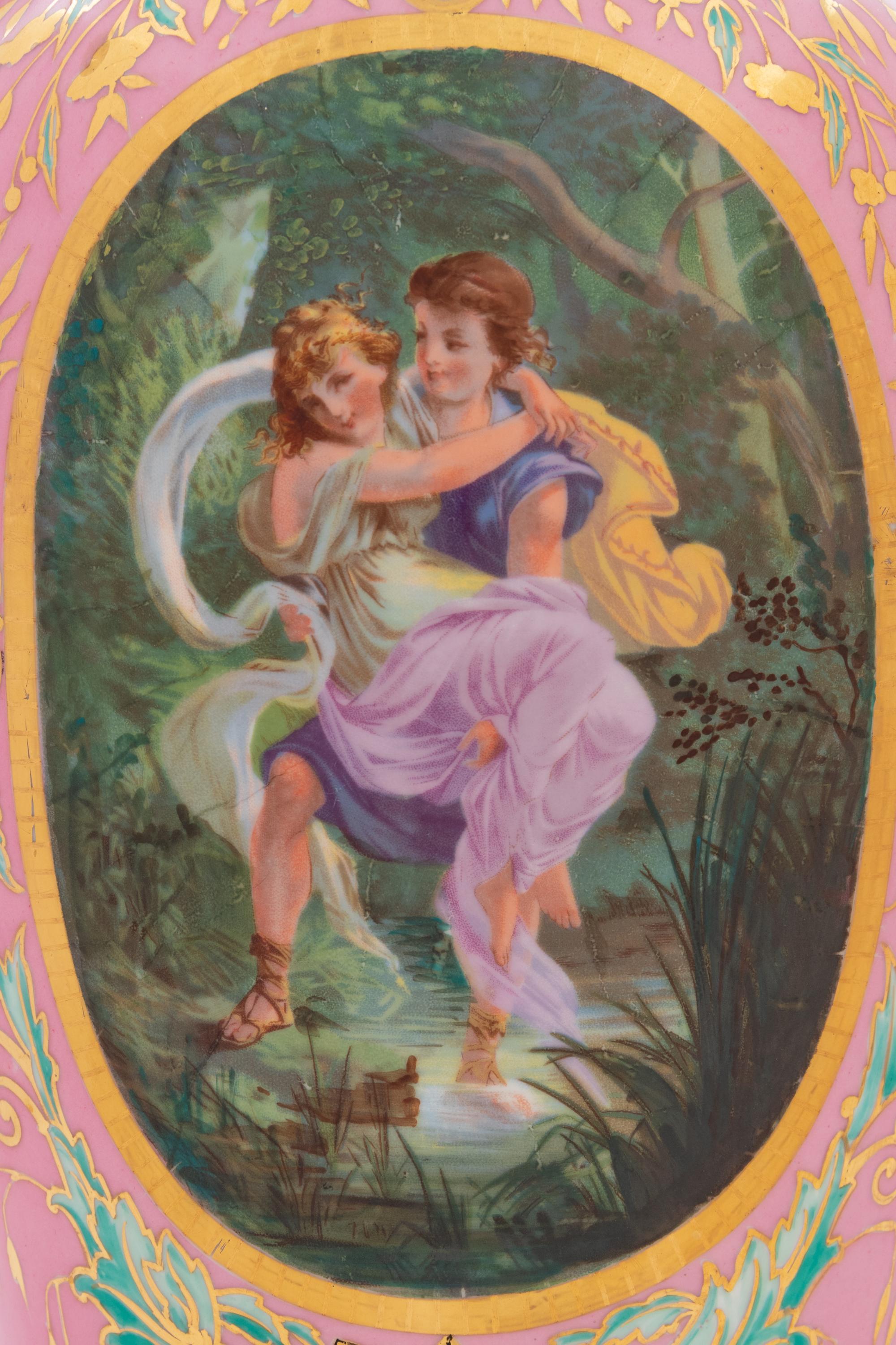 A Pair of Paris Porcelain Painted and Parcel Gilt Vases