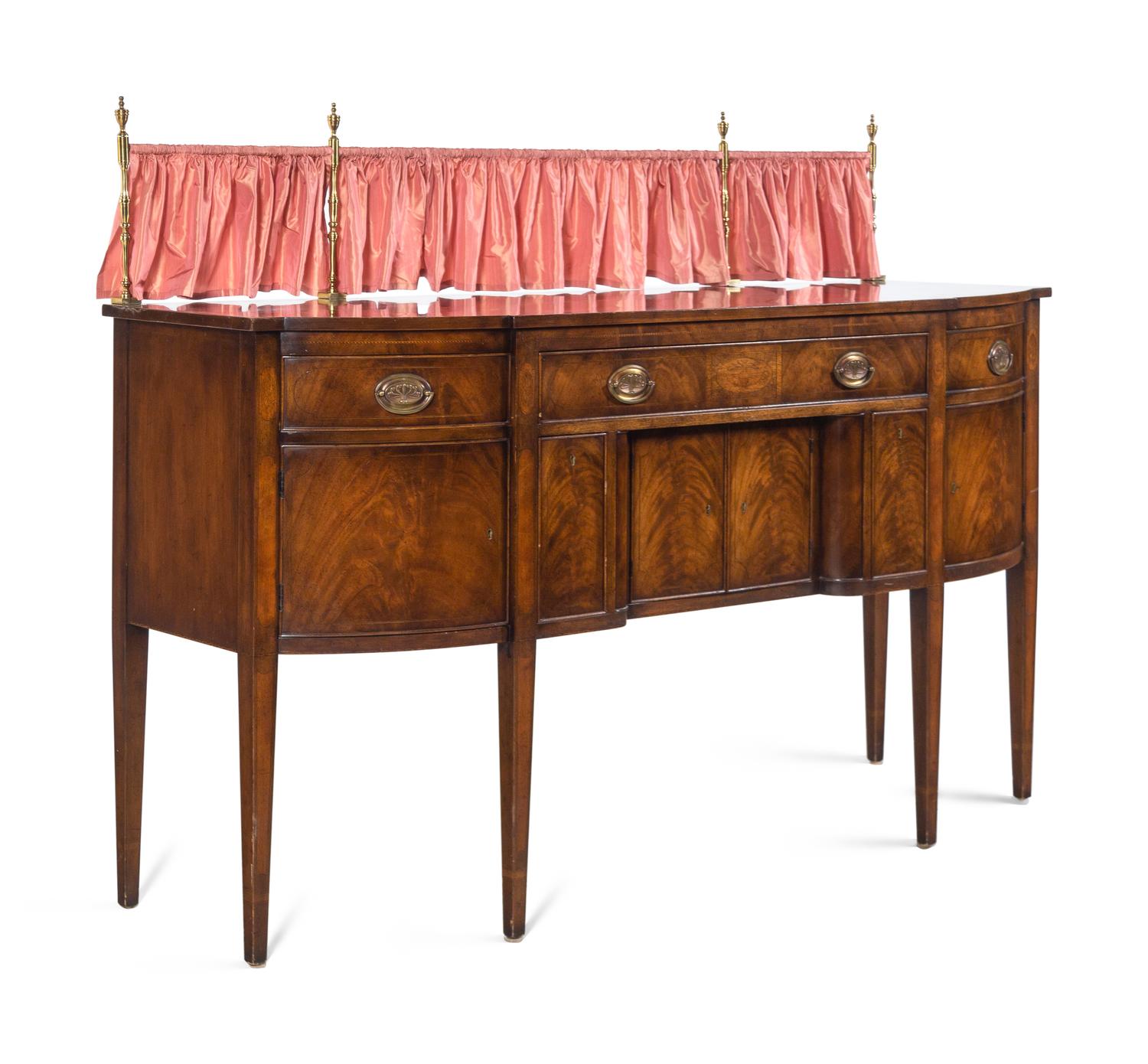 A Regency Style Mahogany Sideboard with Silk Drape on a Brass Gallery