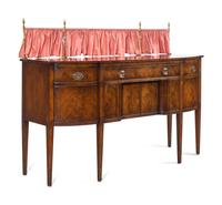 A Regency Style Mahogany Sideboard with Silk Drape on a Brass Gallery