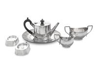 A Collection of Eight English Silver Table Articles