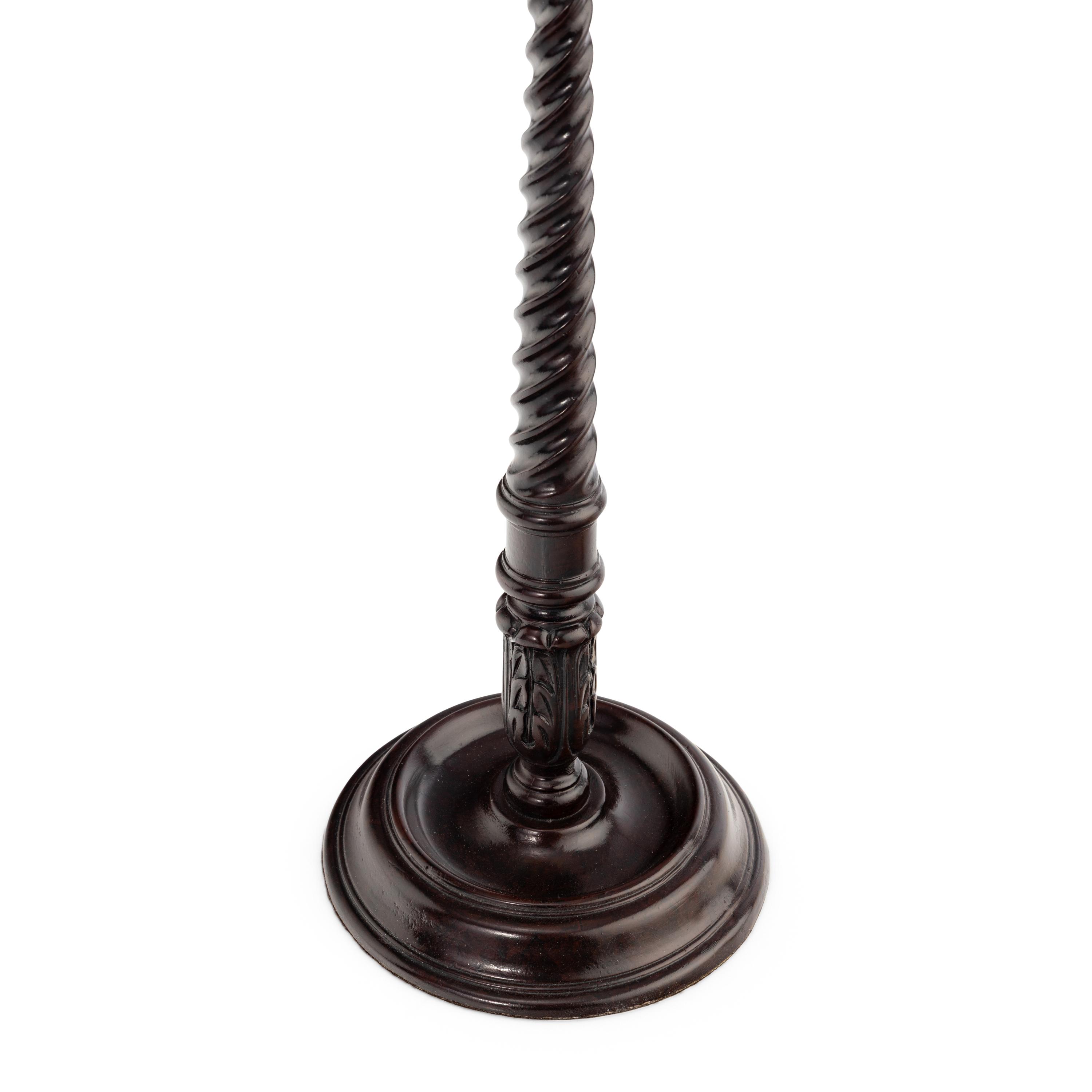 A Carved Mahogany Barley Twist Form Lamp