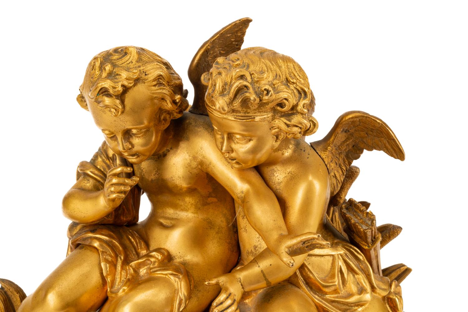 A French Gilt Bronze Figural Mantel Clock